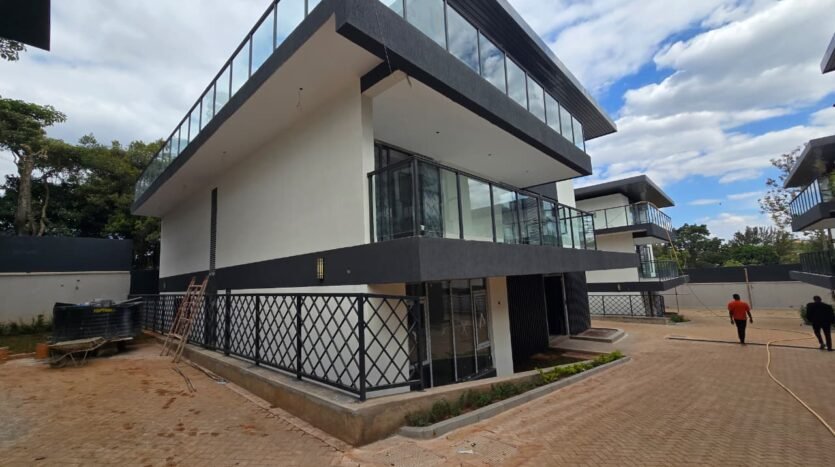 6 bedroom villa with lift in Lavington, double-volume lounge