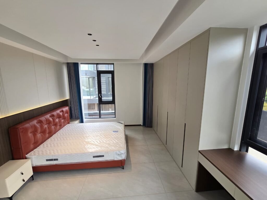 6 bedroom villa with lift in Lavington, double-volume lounge