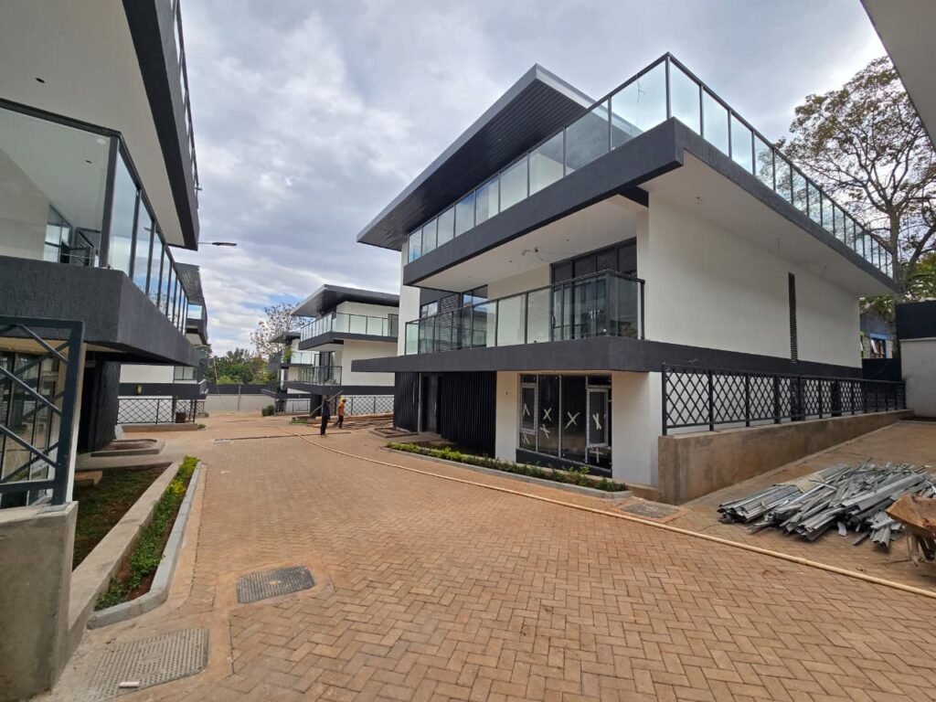 6 bedroom villa with lift in Lavington, double-volume lounge