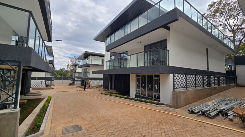 6 bedroom villa with lift in Lavington, double-volume lounge
