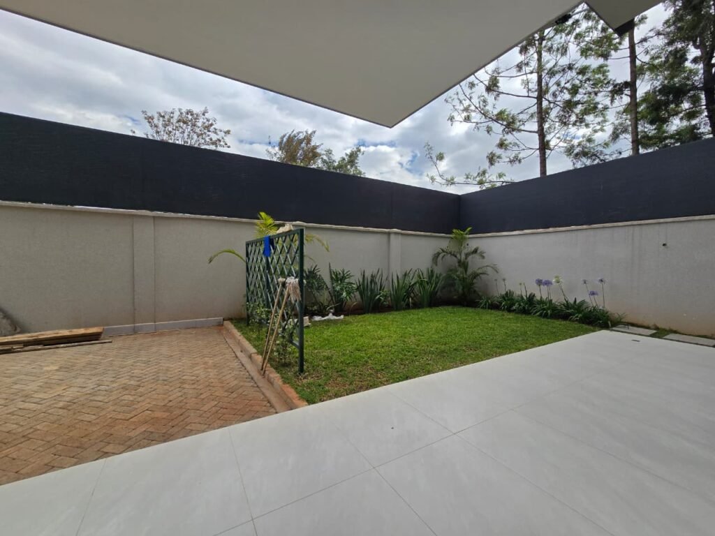 6 bedroom villa with lift in Lavington, double-volume lounge